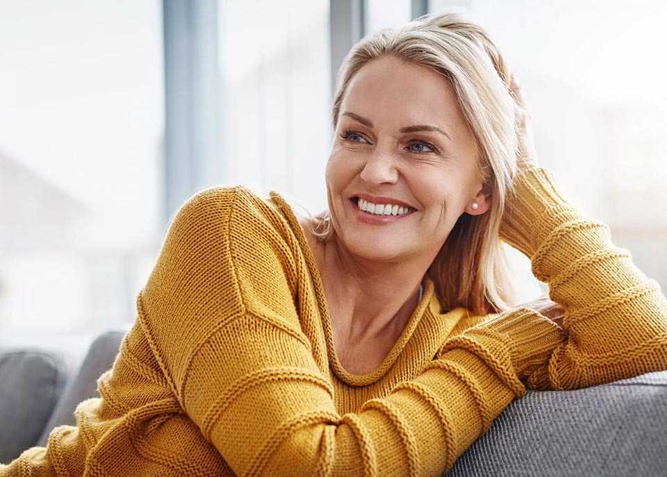 Woman in her 40's smiling